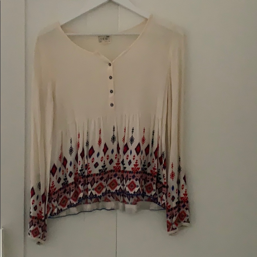White half way buttoned patterned girls shirt